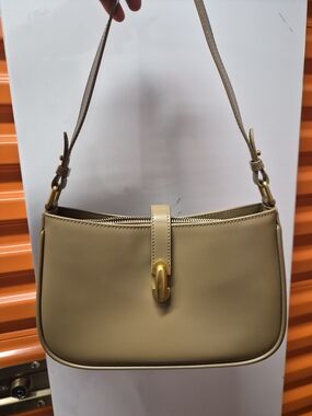 Elegant Beige Shoulder Bag with Gold Accent